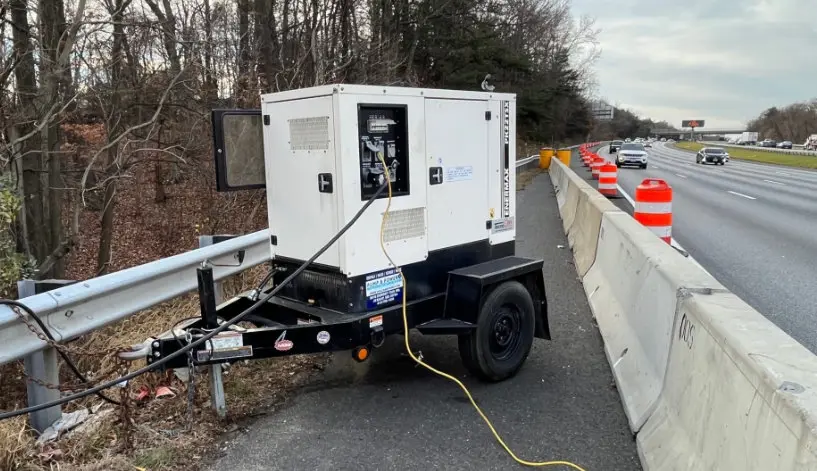 A generator rented from Holland Pump in operation on the side of the road