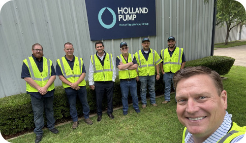 Holland Pump rental solutions employees in front of branch as part of The Workdry Group