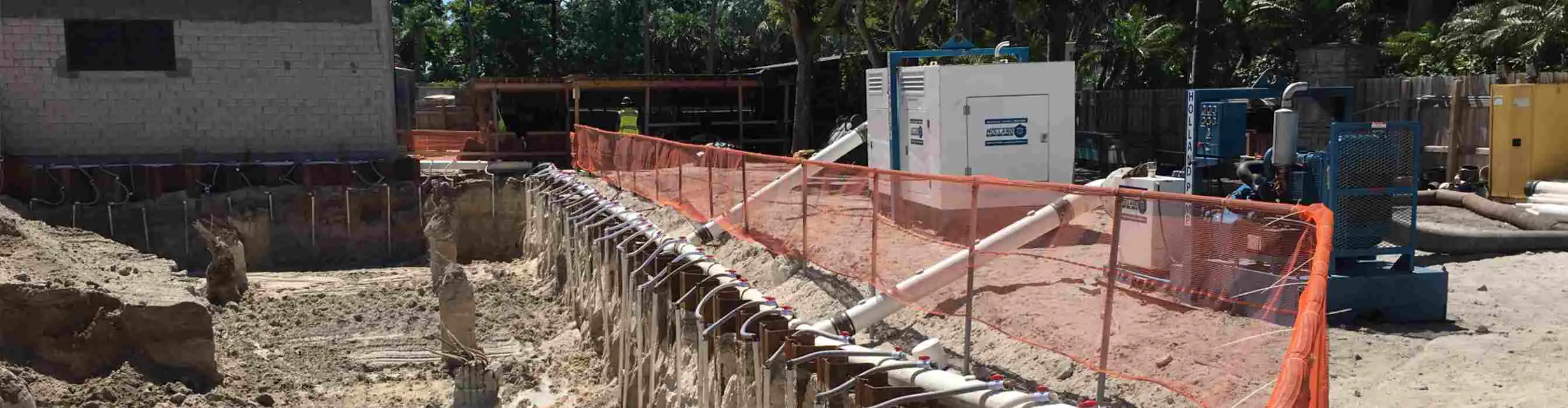 A Holland Pump wellpoint system in South Florida using two wellpoint pumps to lower groundwater levels for foundation dewatering 